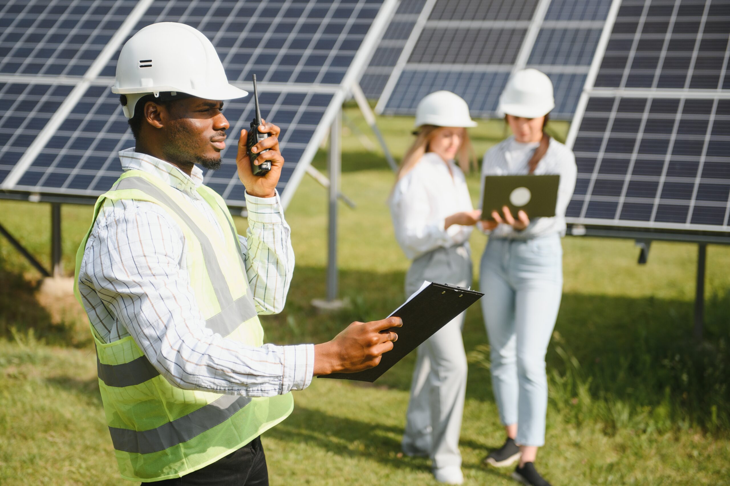 Engineers working on solar farm